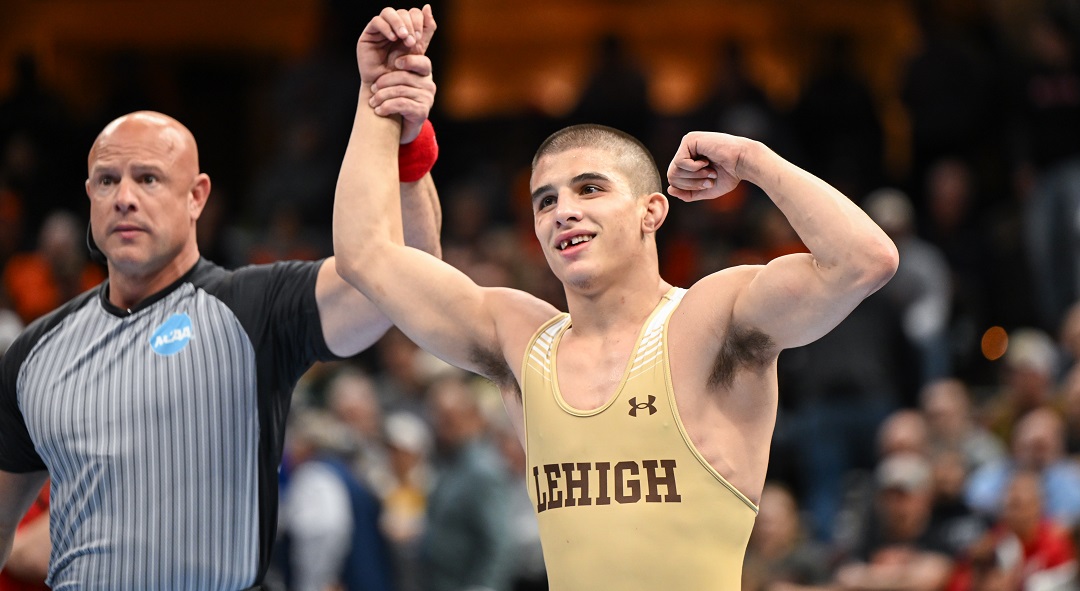 Luke Stanich gets his had raised following his NCAA third-place match victory!
